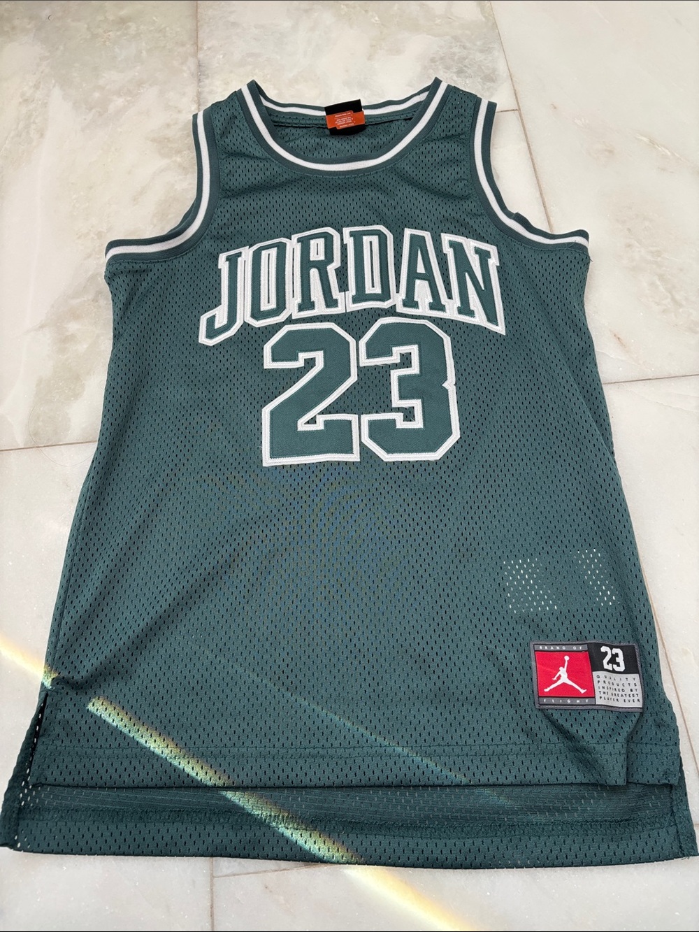 Dark green Jordan basketball jersey